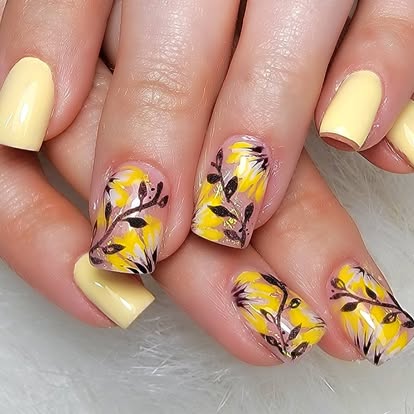 Yellow square nails with black and white hand-painted florals