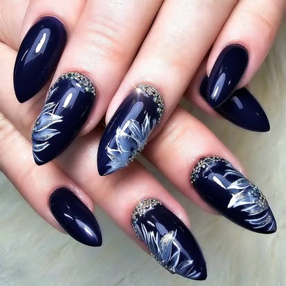 Midnight blue almond nails with white feather artwork